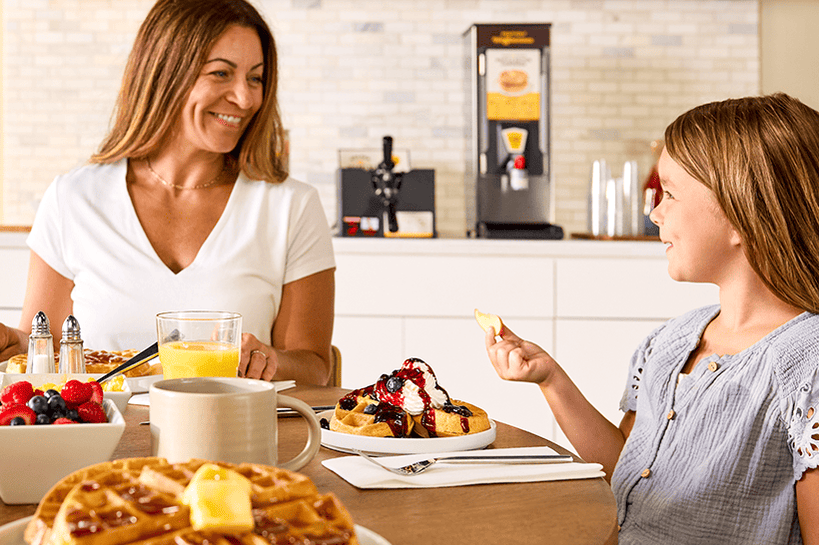 Family eating Golden Waffles